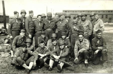 My grandfather, Frank Van Kerckhove (kneeling, 2nd from right), with his own band of brothers. He trained for the Pacific, but remained States-side working the Signal Corp and weapons inspection.